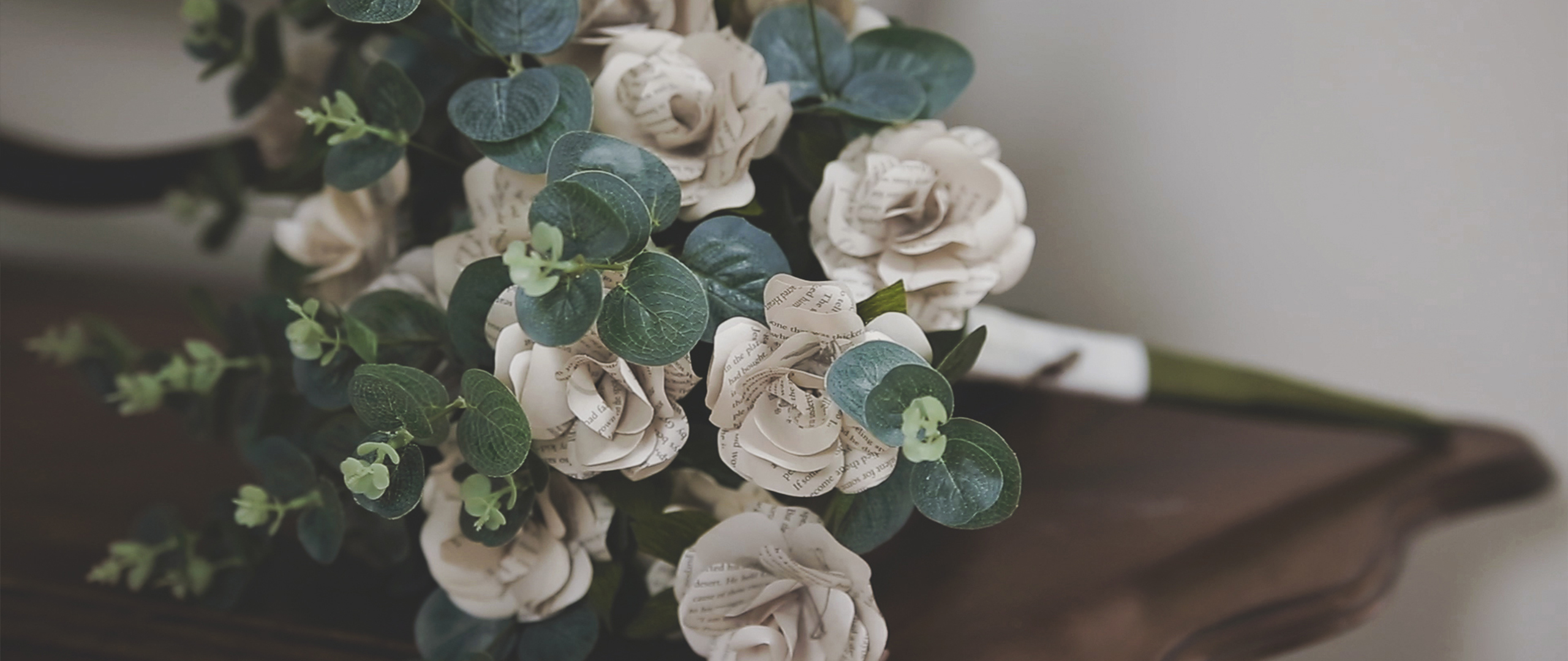 Guardswell Farm Wedding Videographer Green and white paper bridal flower bouquet from Guardswell Farm wedding.