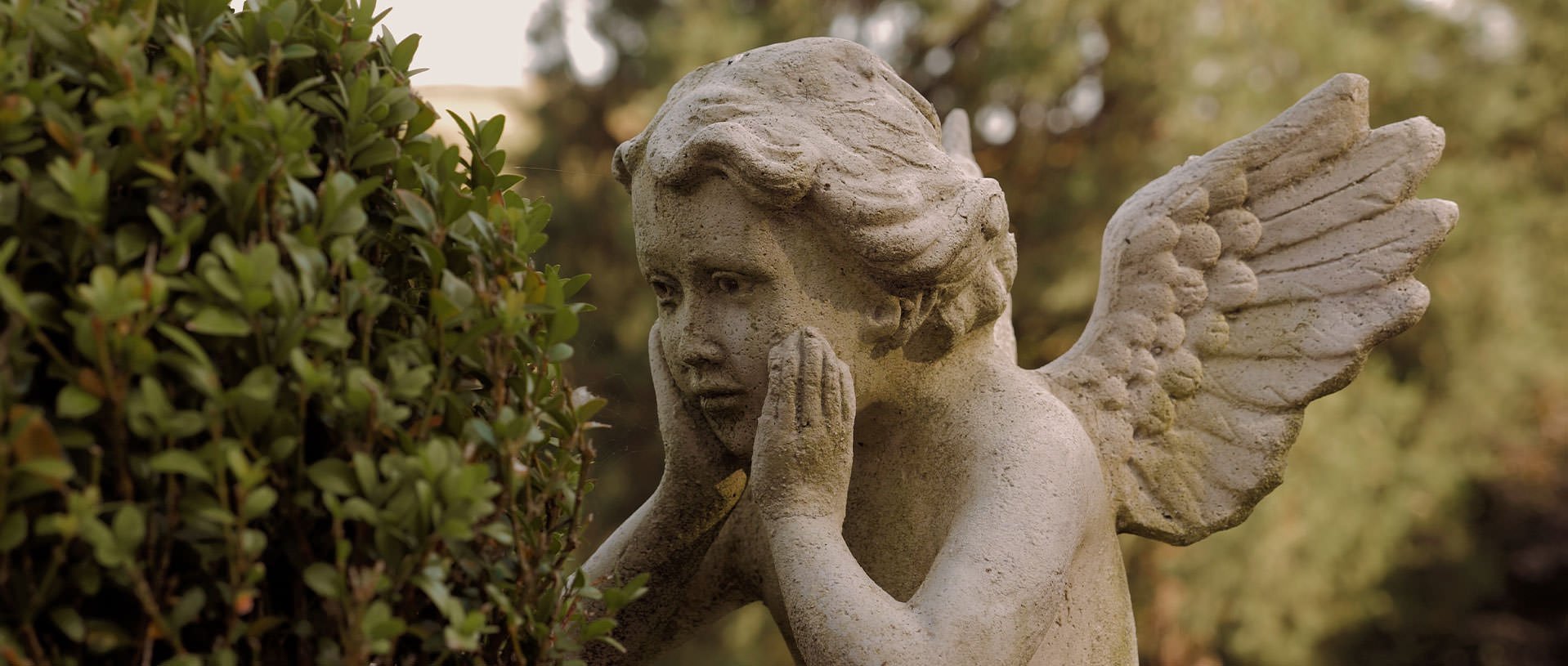 an angel child sculpture at Branxholm Park House wedding in Scottish Borders
